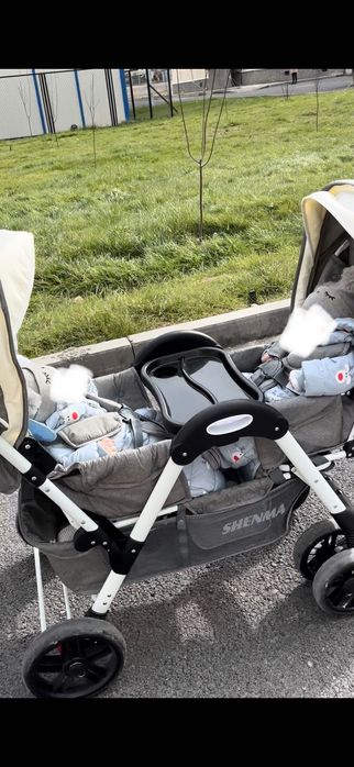 Егіздерге арналған коляска сатылады.