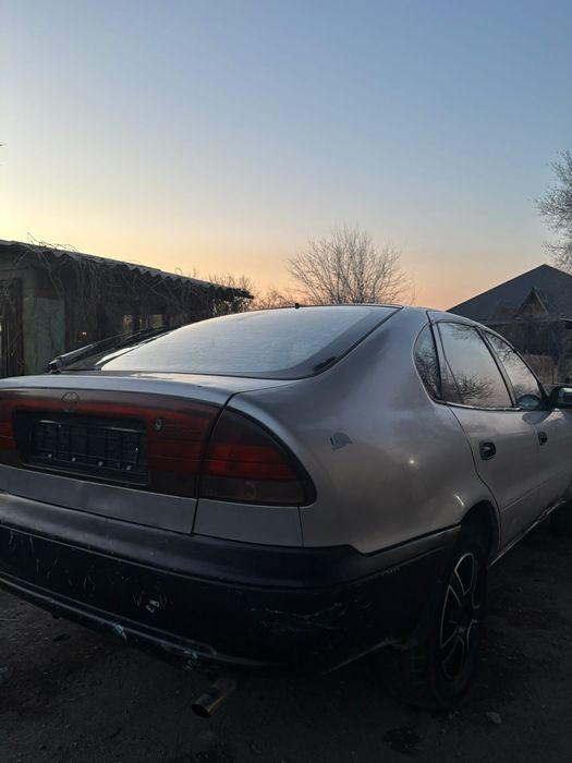 Тайота каролла 107