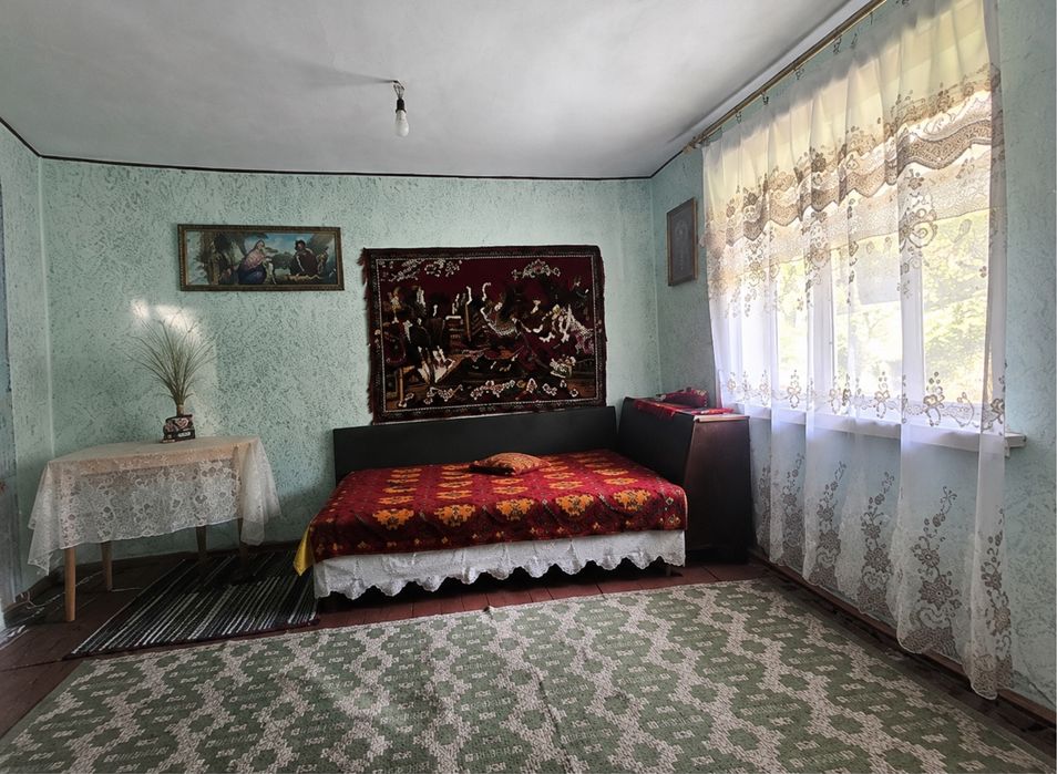Casă de vânzare cu teren 1.640 mp – Sat Ferastrău, Comuna Oituz, jud. Bacău