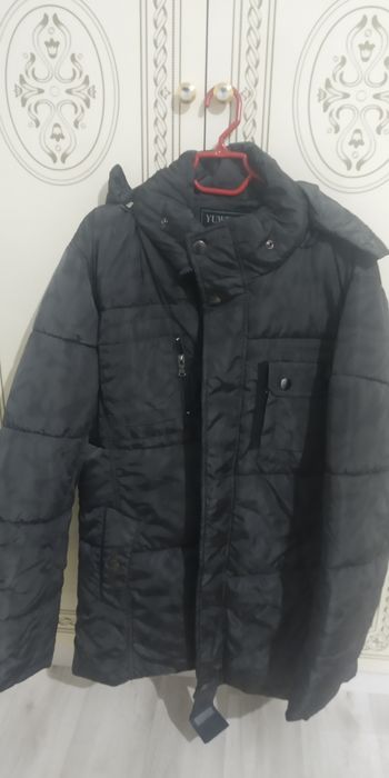 Продам новый Зимнюю куртку