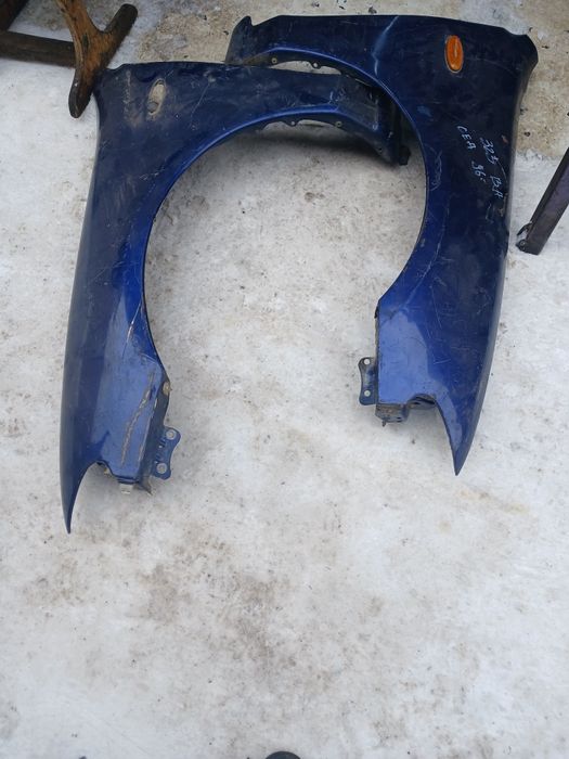 Крыло Мазда 323 седан 1996г в оригинале