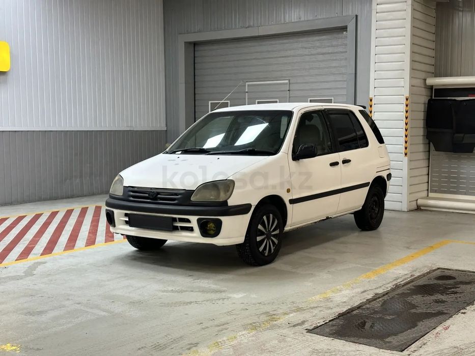 Toyota Raum 1998г