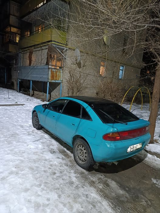 Автомобиль Мазда 323