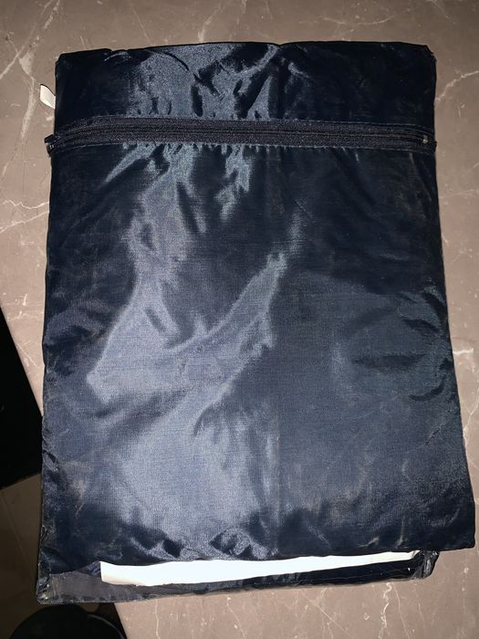 Pelerina de ploaie noua