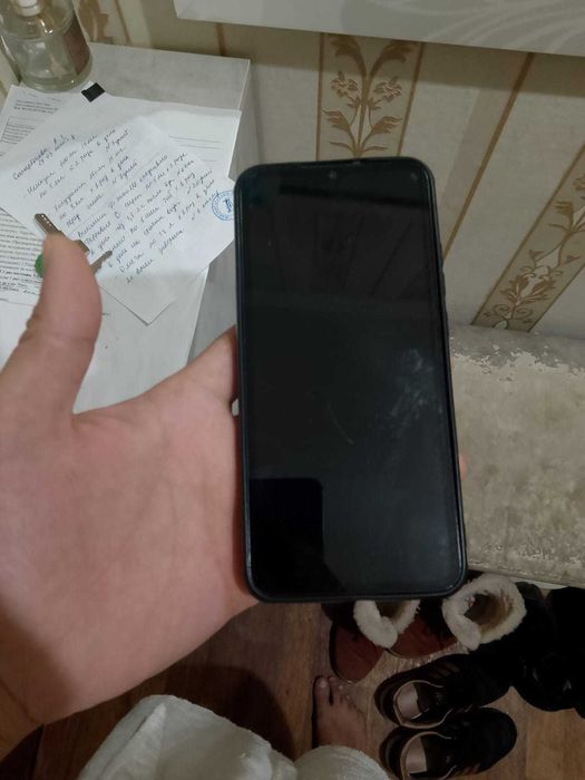 Сотовый телефон  Redmi 9A в отличном  рабочем  состоянии: