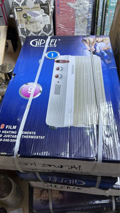 Масляный радиатор, обогреватель