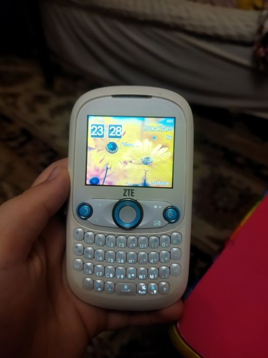 Телефон ZTE q200