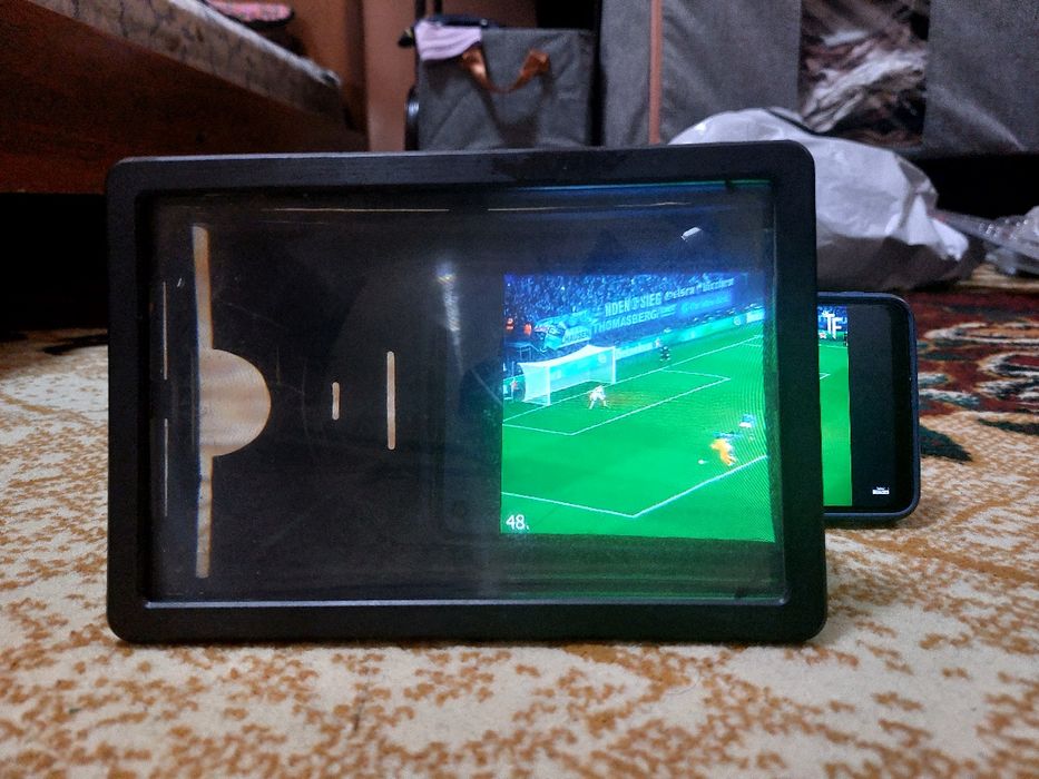 Экран 3D telefon kattalashtirgichi