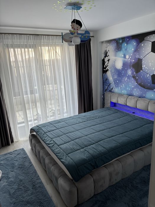 Vand apartament sectorul 5,targ pucheni,2 camere,decomandat,curte