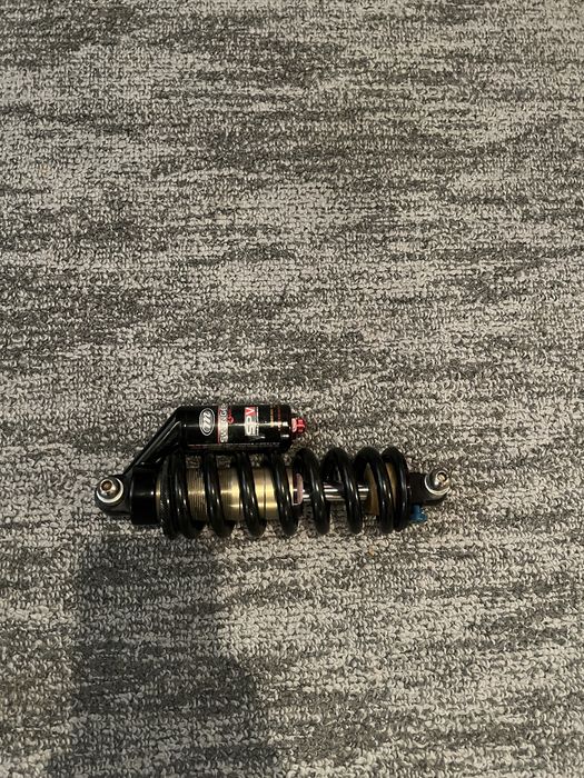 Shock manitou swinger