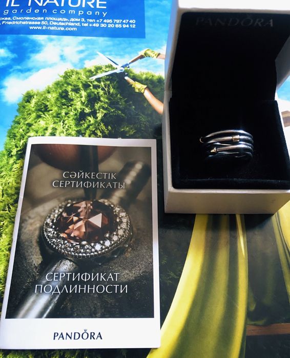 Кольцо Pandora серебряно - золотое