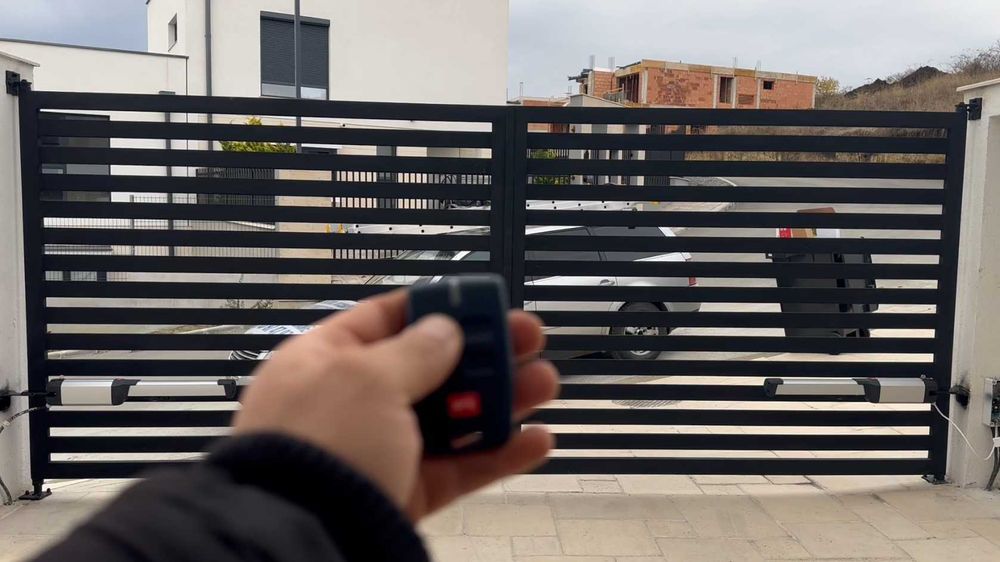 Automatizari porti BFT premium telecomanda aplicatie montaj Cluj