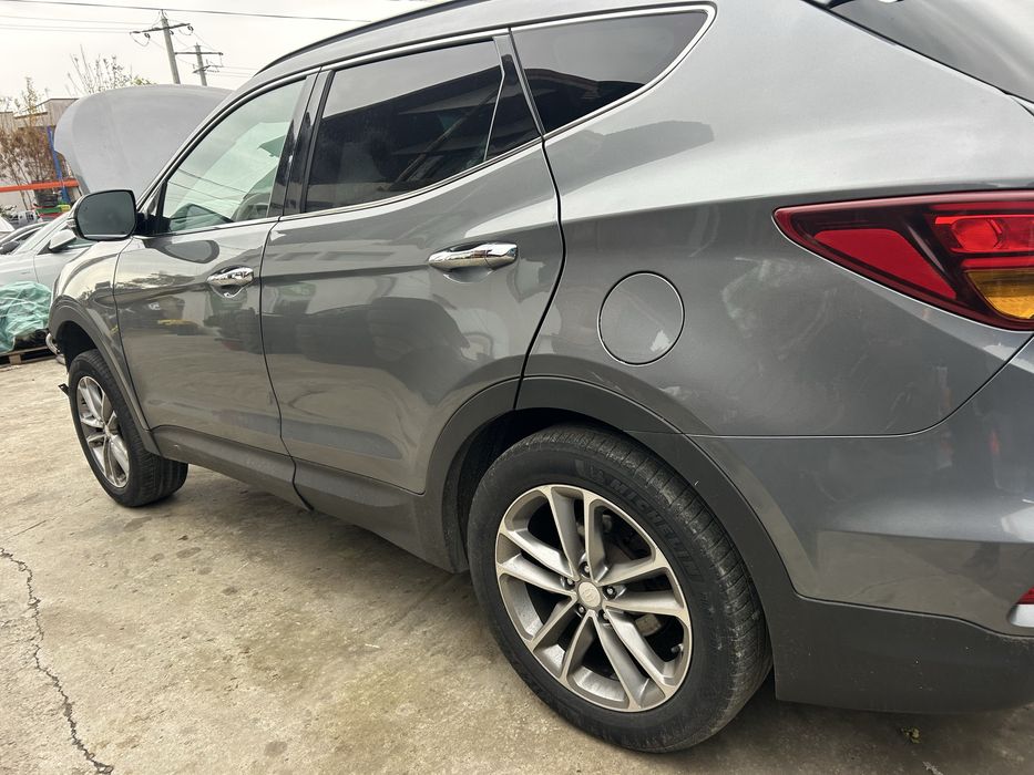 Aripă stanga spate Hyundai Santa Fe 2016
