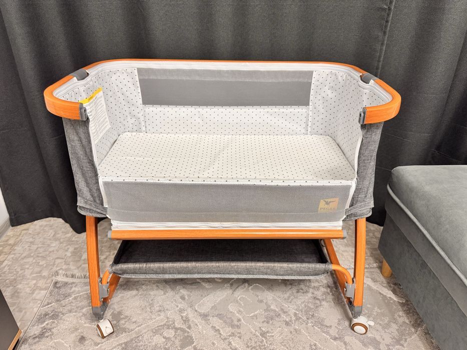 Продам приставную кроватку-манеж