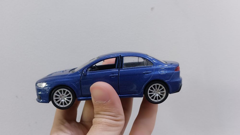 Welly diecast модель Mitsubishi Lancer Evolution X