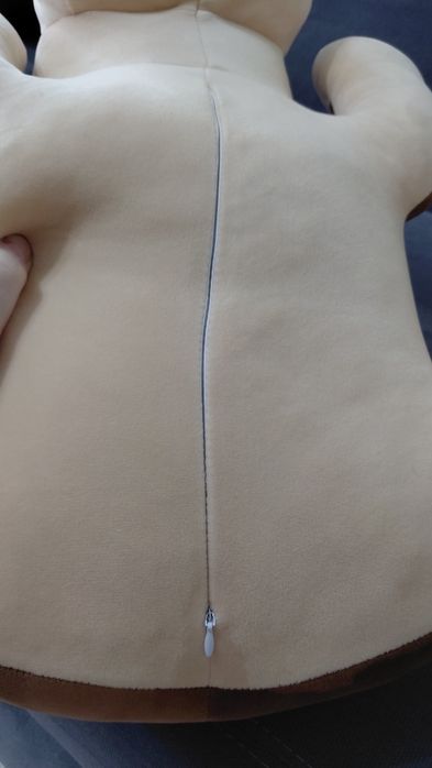 Мягкая игрушка с пледом внутри.