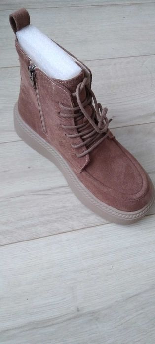 Продам новые зимние ботинки