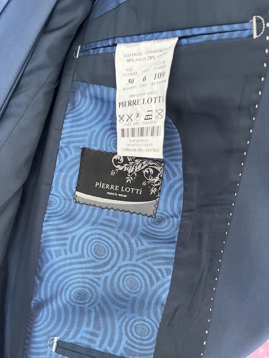 Продам новый костюм