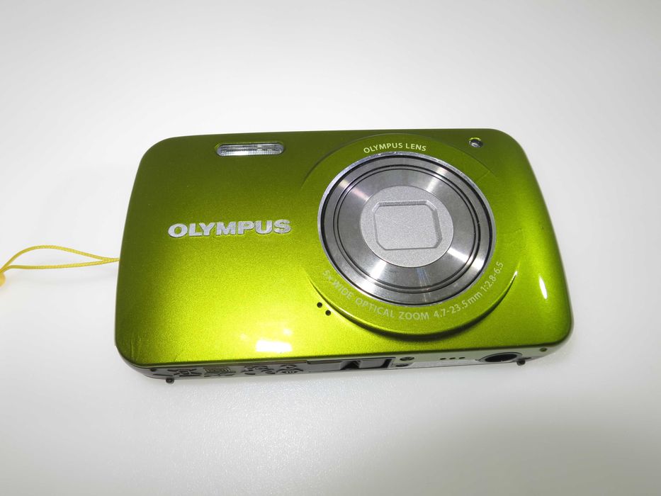 Olympus VH 210 ултра компактен фотоапарат в страхотен свеж зелен цвят и състояние като НОВО, тестван и работи отлично, пълен комплект