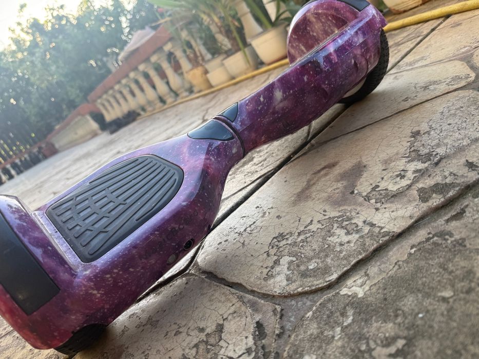 Vând hoverboard Mov Galaxy cu Bluetooth și lumini LED