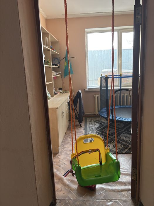 Балаларға арналған качеля