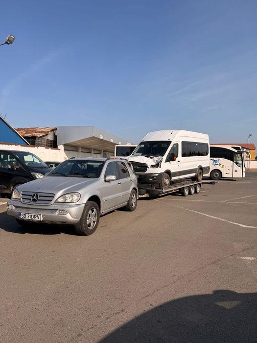 Tractari auto Sibiu,recuperare din autostrada ,utilaje, platforma