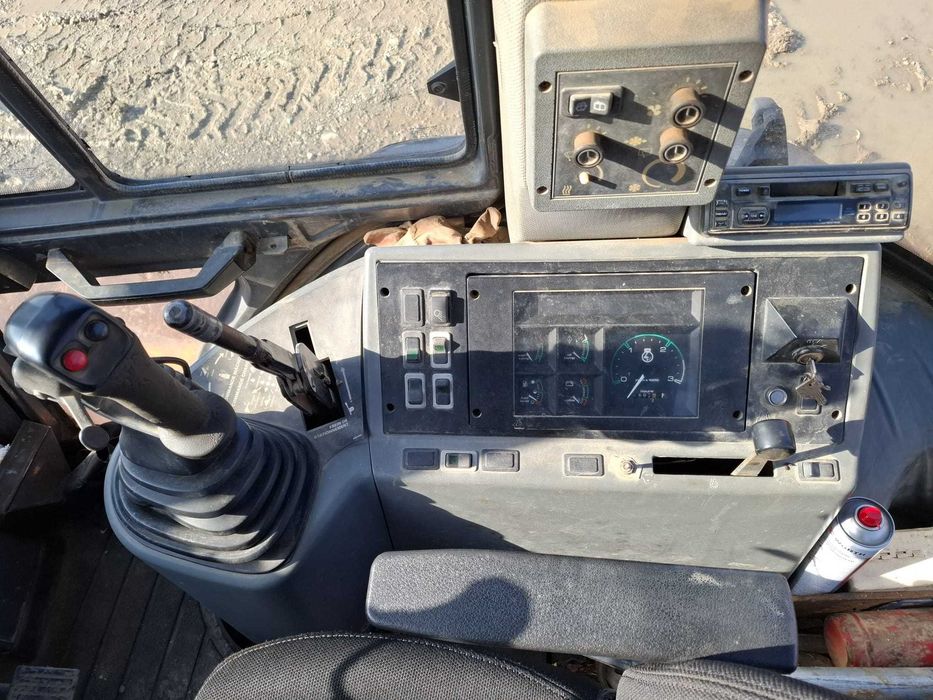 Buldoexcavator CASE 590 Super LE