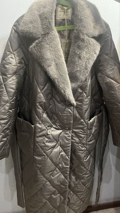 Новая куртка с биркой