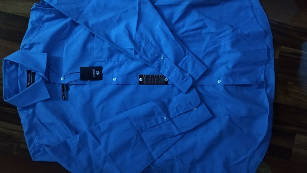 Рубашки новые большие