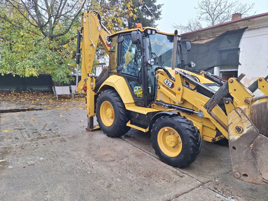 Vand buldoexcavator cat 428