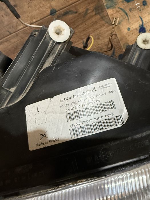 Фара приора 1 левая оригинал бош