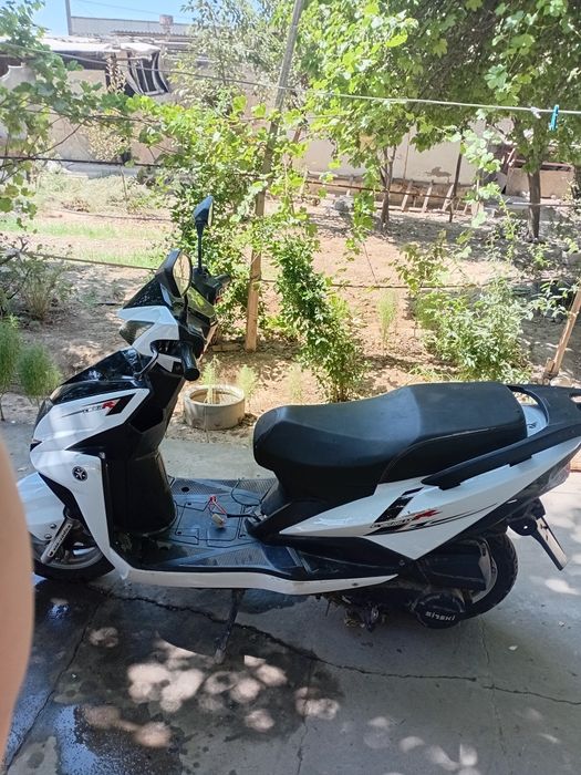 Бензиновый скутер