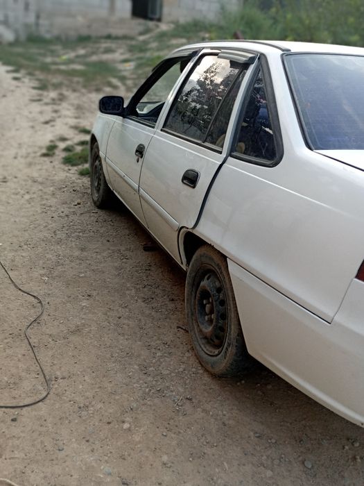 Машина nexia 2012 г