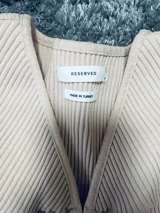 Къса блуза с дълъг ръкав