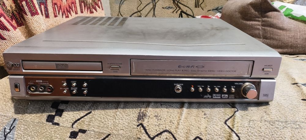 Домашний кинотеатр LG 5.1 с видеомагнитофоном (DVD/VCR)