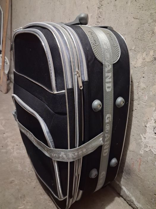 Пътнически куфар с колелца