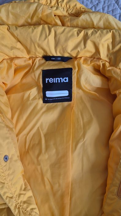 Продам пуховик reima