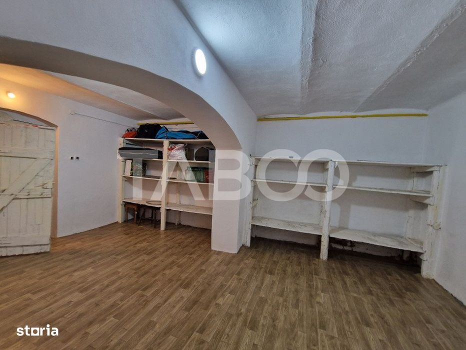 Apartament central 4 camere spatiu comercial garaj si pivnita Sibiu