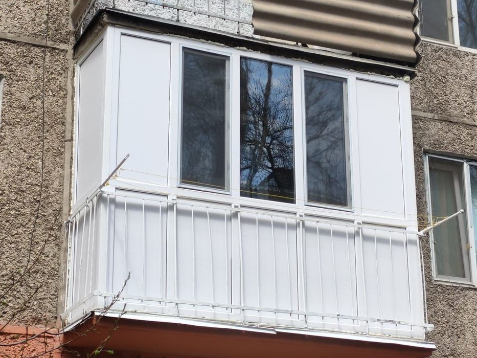 Пластиковые окна двери балконы