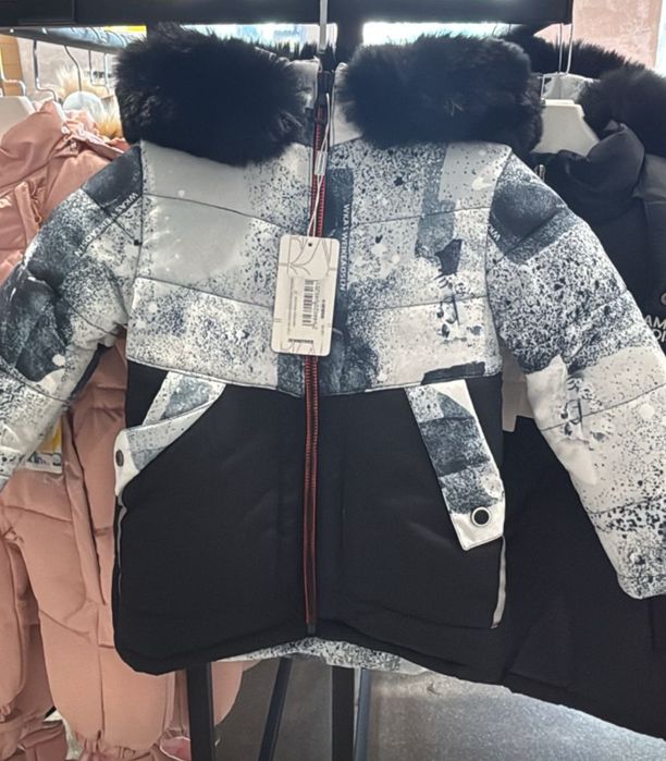 Новый пуховик 110 см