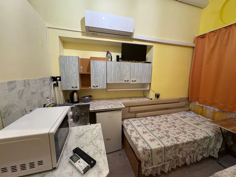 Студио под наем, Център