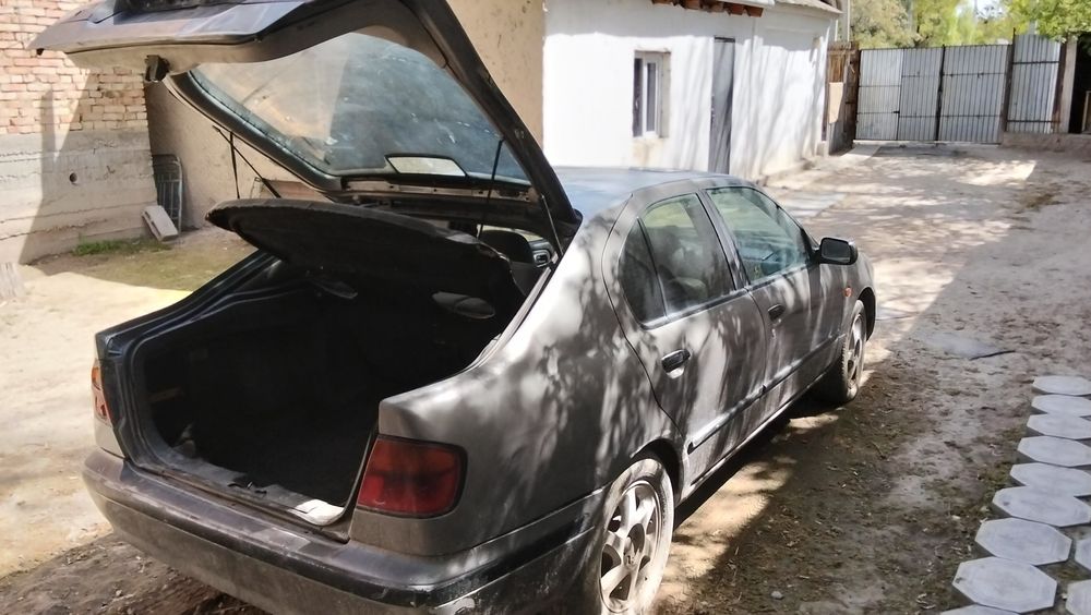 Ниссан Примера P11