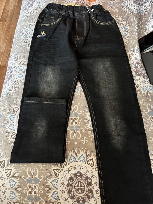 Джинсы (новые)