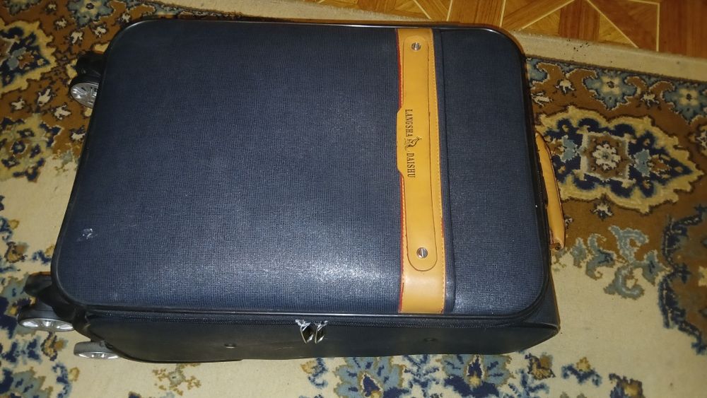 Чемодан на колесах