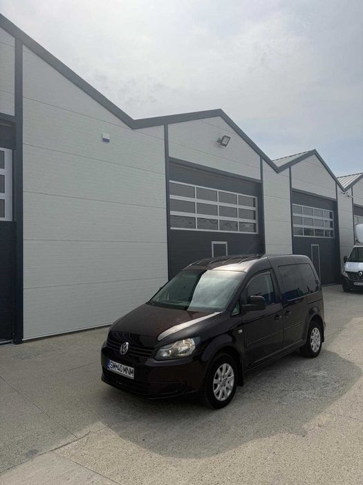 VW Caddy 2012 manual intretinut