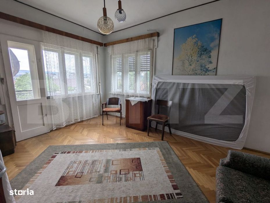 Casa impartita in 2 apartamente de 75 mp, teren 384 mp - Dambul Rotund