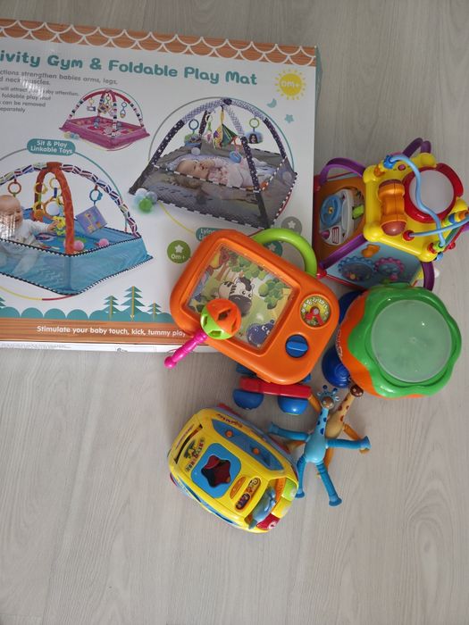 Продам игрушки и развивающие коврик