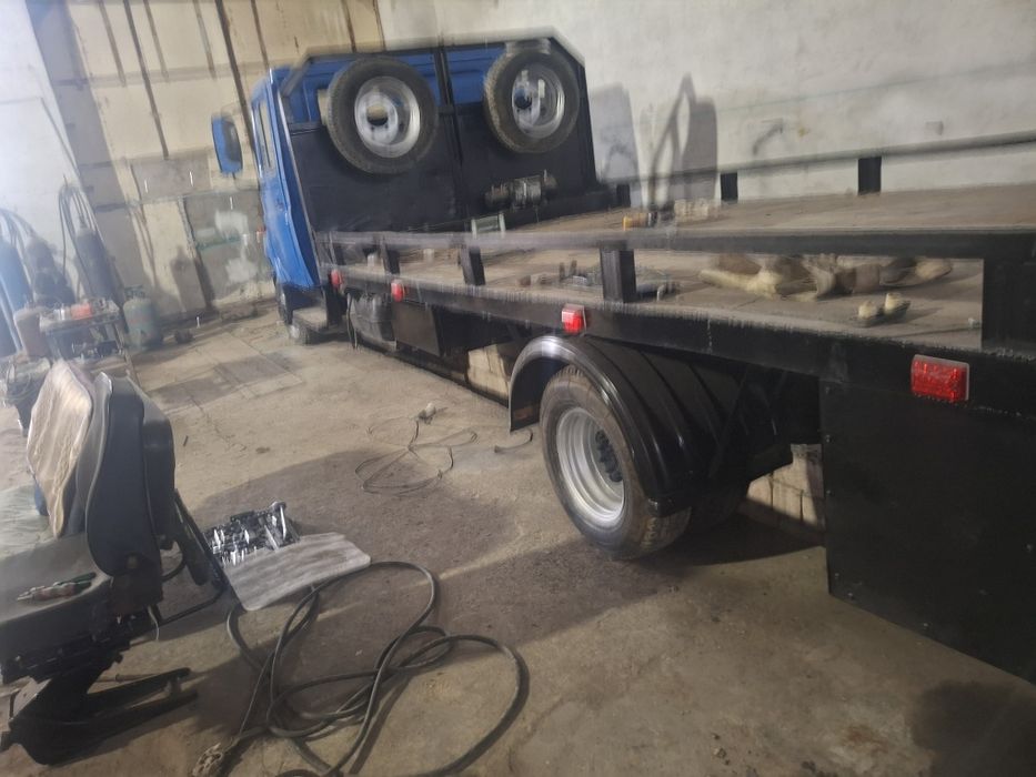 Манипулятор эвакуатор зил бычок