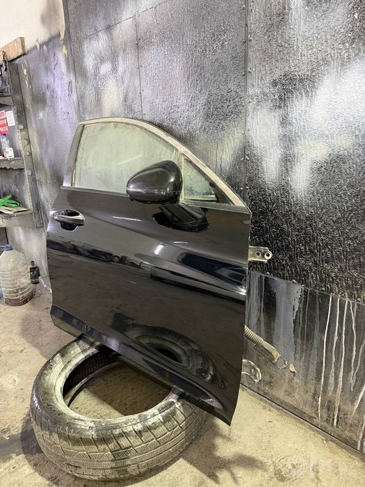 Kia K5.  2024 qora radnoy eshik