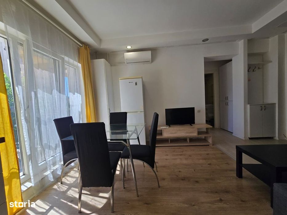 COSMOPOLIS - Apartament cu 2 camere tip studio, mobilat si utilat.